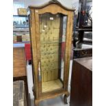 Early 20th cent. Bird's eye display cabinet with arched top and brass furniture. Height 63ins. x