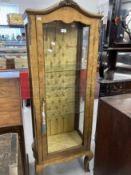 Early 20th cent. Bird's eye display cabinet with arched top and brass furniture. Height 63ins. x