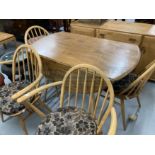 Vintage Design: Ercol beech and elm dining table and four chairs. 44ins. x 28ins.