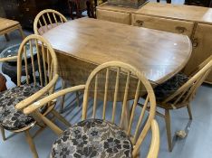 Vintage Design: Ercol beech and elm dining table and four chairs. 44ins. x 28ins.