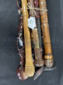 Walking sticks, carved, three African and four Asian. (7)