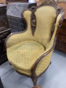 20th cent. Carved show wood upholstered armchair, carved with angels and doves of peace.