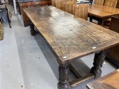 17th cent. Style, oak refectory table, the cleated plank top with foliate carved frieze, on leaf