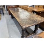 17th cent. Style, oak refectory table, the cleated plank top with foliate carved frieze, on leaf