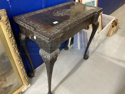 Late Georgian tea table, the mahogany top with later carving on cabriole legs. Height 16ins. x Width