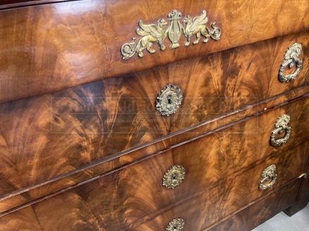 Empire mahogany and ormolu mounted commode, the grey marble top above four long drawers on shaped - Image 2 of 4