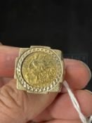 Jewellery: Half Sovereign mounted in a 9ct gold ring. 11g.