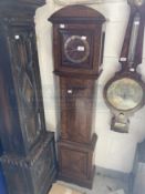 Clocks: 20th cent. Oak grandmother, treen face, brass chapter ring. 12ins. x 54ins. (7ins dial)