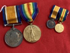 Medals: Pair of WWI Victory medals awarded to Lieutenant A. Castle, plus a set of miniatures.
