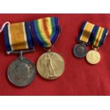 Medals: Pair of WWI Victory medals awarded to Lieutenant A. Castle, plus a set of miniatures.