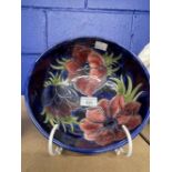 Ceramics: Moorcroft blue ground fruit bowl, tube decorated poppies in relief. 3ins.