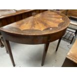 Georgian mahogany, satinwood and marquetry dressing table the demi lune top enclosing a fitted