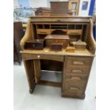 Early 20th cent. Oak tambour front desk of delicate proportions. 35ins.