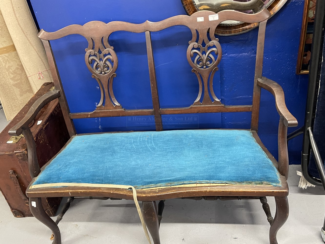 20th Cent. Chippendale style 2 seater hall seat with blue upholstered drop in seat.