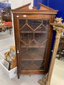 19th cent. Mahogany astragal corner display cabinet on three supports with broken pediment cornice,.