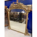 19th cent. Gilt and Gesso over mantle heavily decorated with acanthus leaves above the arched top.