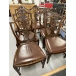 Mid 20th cent. Mahogany dining chairs, shield corn sheaf backs with Rexine drop in seats. (6)