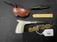 Smoking Requisites: Goedewaagen pipe A/F, a Brier Dutch treen shoe pipe, a silver, brass & bone 1ft.