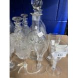 19th cent. Glass: Three engraved bulbous decanters 11ins, two spiral decanters 7ins, plus eight