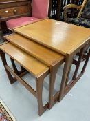 20th cent. Teak G plan nest of three coffee tables.