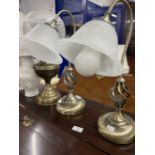 20th cent. Pair of metal lamps, a brass lamp, and a pair Blanc de Chine pottery lamps.