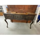 19th cent. Carved Gothic oak buffet on cabriole supports.