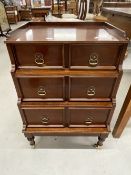 20th cent. Mahogany chest of three drawers taking the form of a step commode. 19ins.