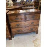 19th cent. Mahogany chest of 2 over 3 drawers on swept bracket supports. 34ins. x 16ins. x 31ins.