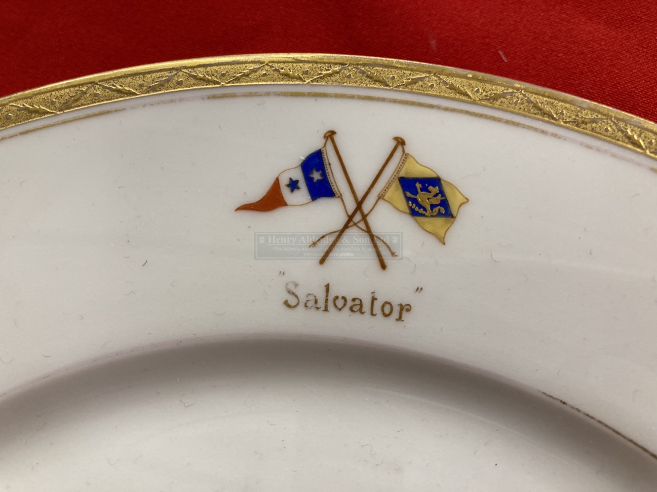 19th cent. Ceramics: Pair of dinner plates, gilt rimmed with crossed flags and Salvator makers label - Image 3 of 3
