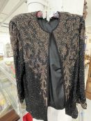 Fashion: 1950s Style black beaded evening jacket, size 12.