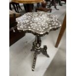 19th cent. Asian hardwood tripod table inlaid with mother of pearl. 24ins.