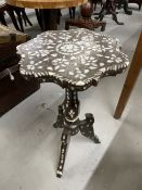 19th cent. Asian hardwood tripod table inlaid with mother of pearl. 24ins.