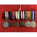 Militaria: WWII British Medal group with a reproduction Military Medal, 39-45 Star, Italy Star,