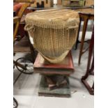 African tribal drum and stand of books, made of plaster.