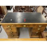 Edwardian pine desk of 9 drawers with leatherette top. W4ft. x D3ft. x H30ins.