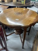 Edwardian mahogany tables, one with shaped round top with inlaid central panel, the other plain