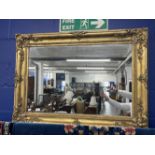 19th cent. Gilt frame with later mirror inset. 34ins. x 45ins.