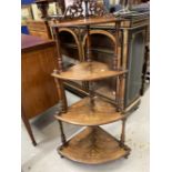 Late 19th cent. Walnut inlaid four tier what not with fretwork top. 49ins.