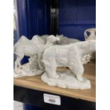 Continental white porcelain animals, bear, camel, etc. Plus three cream ware style baskets and a