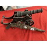 20th cent. Decorative cast cannon 17ins, and decorative flintlock pistol. (2)