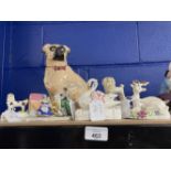 Late 19th cent. Ceramics: Staffordshire miniature figure of a poodle on plinth, stag, brown/white