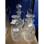 Crystal Glass Decanters: 20th cent. One ewer shaped, a pair with mushroom stoppers, plus one more,