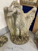 Garden Statuary: 20th cent. Concrete eagle. 36ins. Plus a pair of stone lions. 30ins.