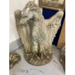 Garden Statuary: 20th cent. Concrete eagle. 36ins. Plus a pair of stone lions. 30ins.