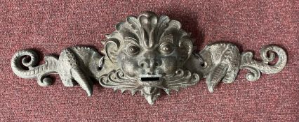 19th cent. Bronze grotesque wall plaque. 24ins.