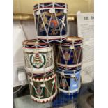 Militaria: Post war ice buckets taking the form of regimental drums. 7ins. (5).