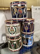 Militaria: Post war ice buckets taking the form of regimental drums. 7ins. (5).