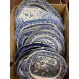 19th cent. Pottery: Blue and white willow pattern plates and a blue and white strainer. A/F.