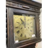 Clocks: 20th cent. 8 day oak longcase, brass dial, signed Maple, London.