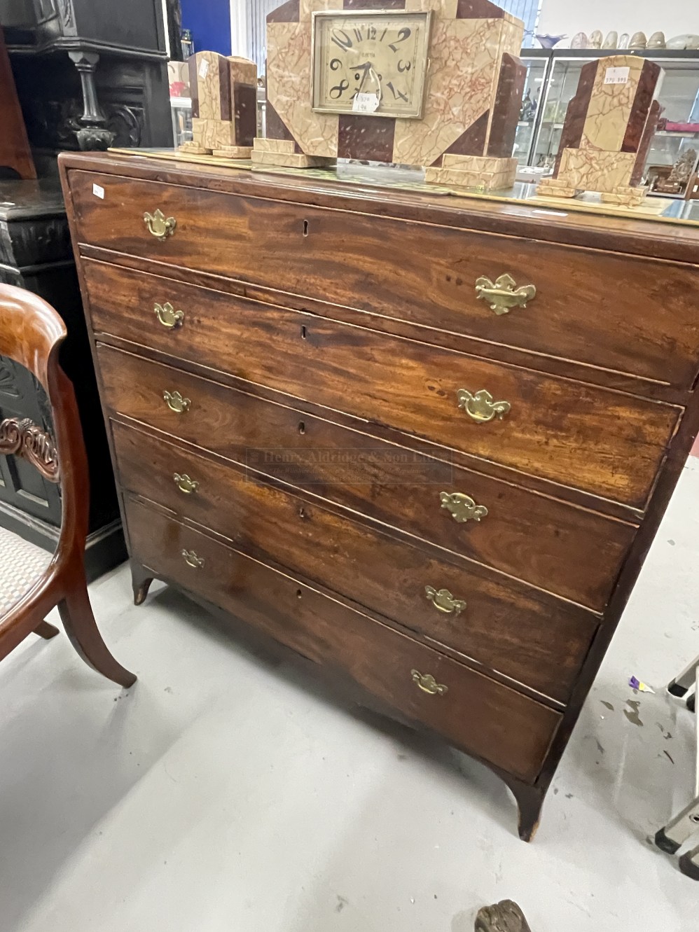 Georgian mahogany cross banded chest of 5 long drawers on bracket feet. W42ins. x D18½ins. x